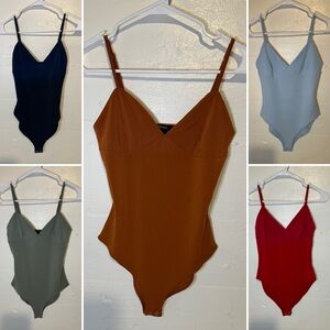 Lot of Forever 21 bodysuits